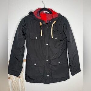 Woolrich women’s Black Hooded Jacket with Red Buffalo check plaid Lining